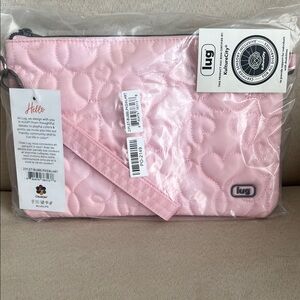 NWT Lug Ziplet Wristlet RFID Wallet In Bubble Pink 🫧